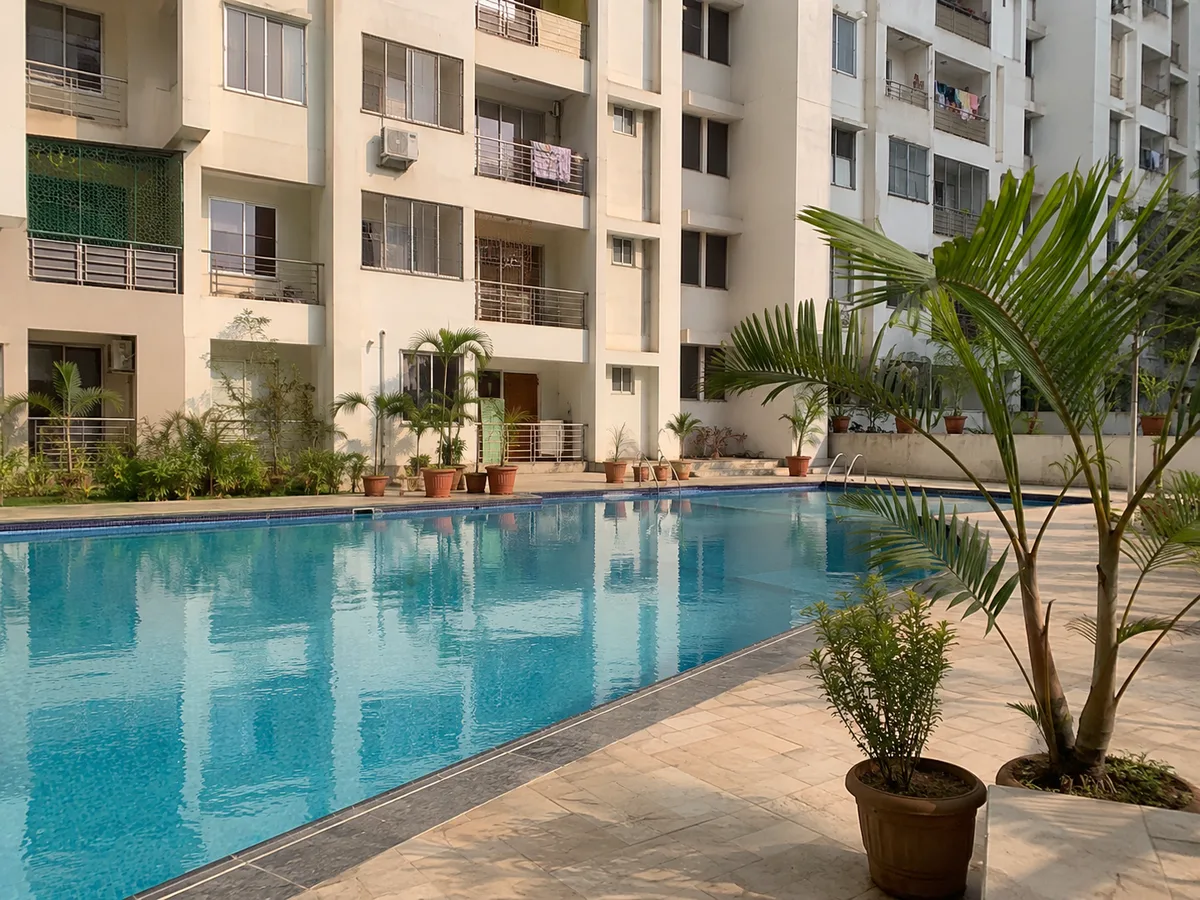 Swimming pool and kids' pool amenity at Anuraag Amogh, Varthur